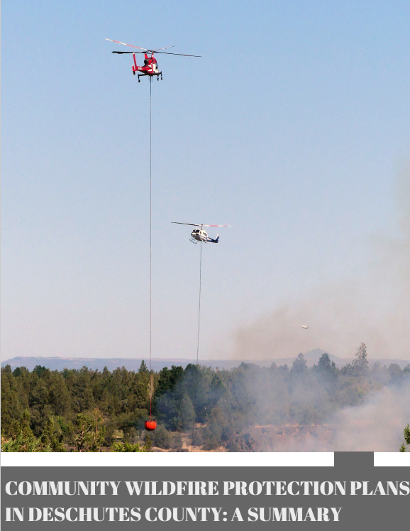 Image of Community Wildfire Protection Plan Basics Magazine Cover Page with two helicopters dropping water over a fire.